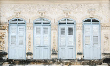 vintage window on wallの写真素材