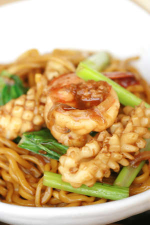 Chinese noodle stir with squid and shrimpの写真素材