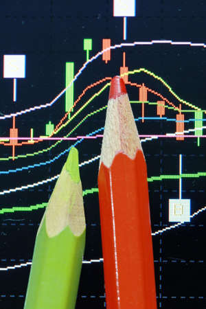 pencil and candlestick chart の写真素材