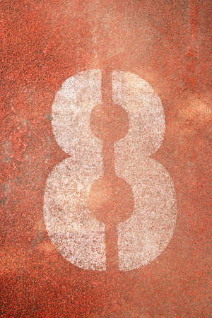 8 alphabet on red rubber running track の写真素材