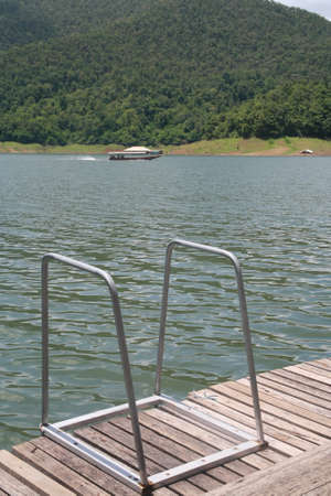 stair of natural swimming pool, natural lake and hillside の写真素材