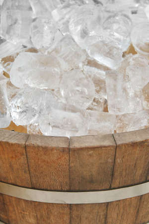ice in wood pot の写真素材