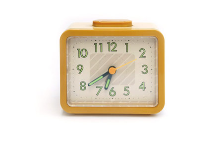 yellow clock isolated の写真素材