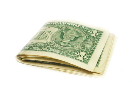 Folded US dollar bills isolated 