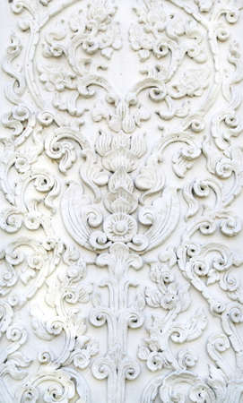 White thai art stucco wall, temple の写真素材