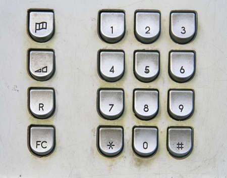 Telephone keyboard in public phone の写真素材