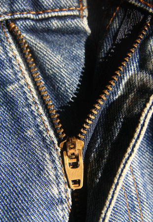 zipper of blue jeans の写真素材