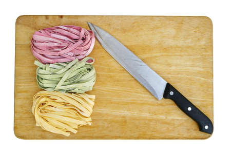 colorful pasta fettuccine and knife の写真素材