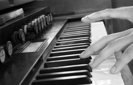 close up hand play vintage piano background