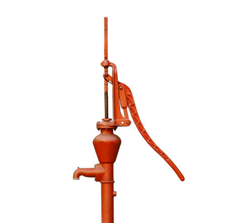 orange manual water pump isolated on whiteの写真素材