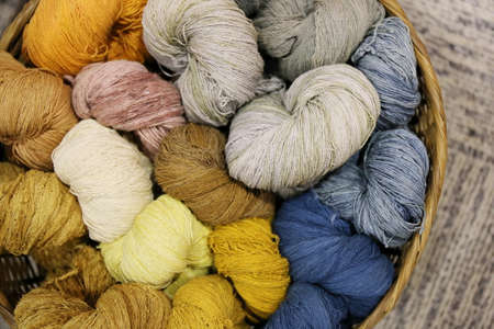 colorful cotton thread in basketの写真素材