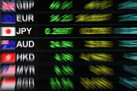 blurry currency exchange market backgroundの写真素材