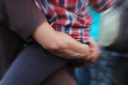 blurred people hand walk on roadの写真素材