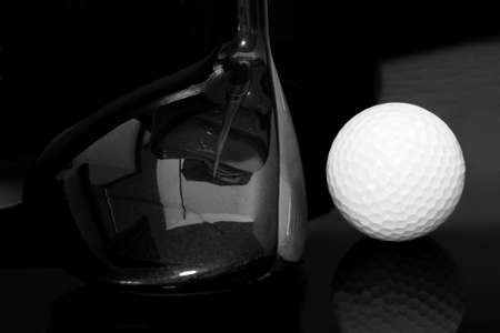 closeup golf putter head and ballの写真素材