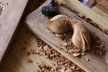 gouge wood chisel carpenter tools working wooden backgroundの写真素材