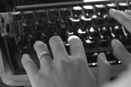 closeup hand typing typewriterの写真素材