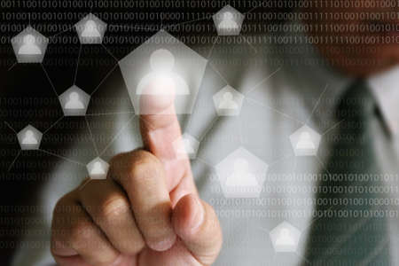 businessman finger clicking social network backgroundの写真素材