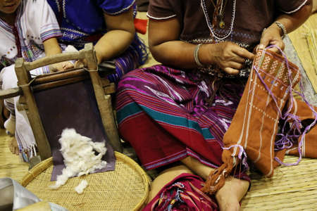 women hand sewing, Thailandの写真素材