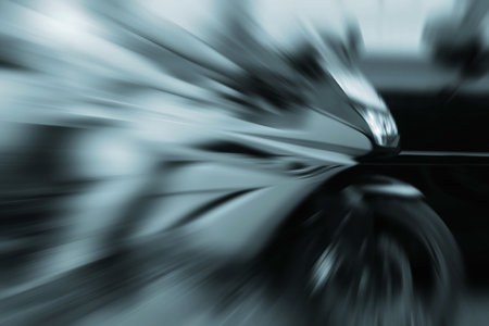 blurred fast moving motorcycle, backgroundの写真素材