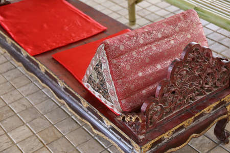 triangle pillow on bed, Thai styleの写真素材