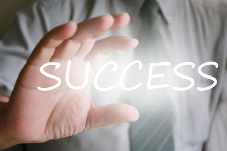 businessman hand, success textの写真素材