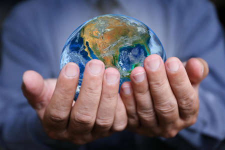 businessman with the earthの写真素材