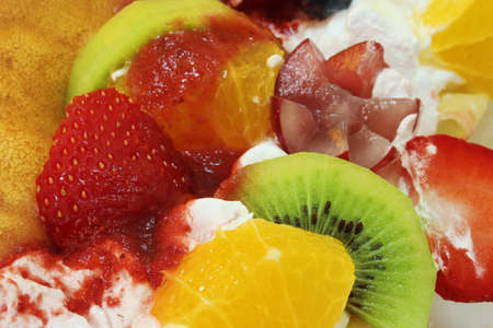 colorful fruit with crape in plateの写真素材
