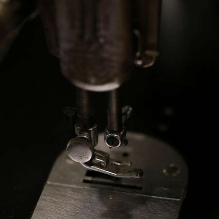 closeup fabric and sewing machineの写真素材