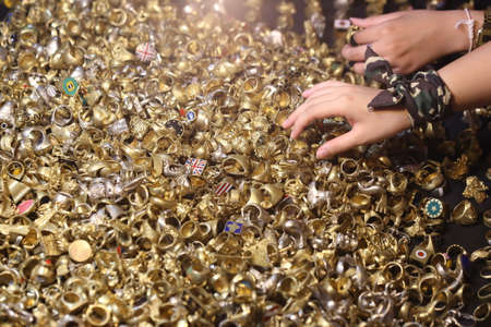 many gold and silver ring backgroundの写真素材