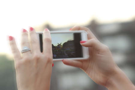 blurred people take photo, outdoor parkの写真素材
