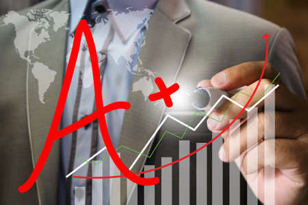 business man's hand writing graph chart, backgroundの写真素材