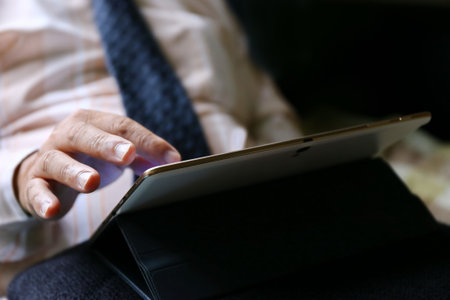 businessman hand use tablet for work