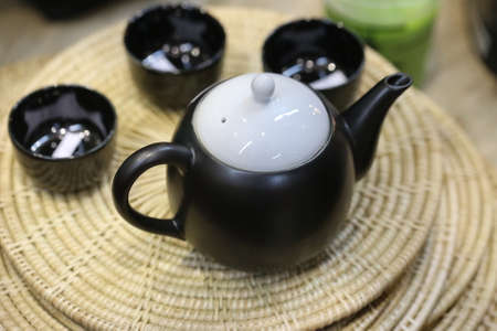 black tea pot set in cafeの写真素材