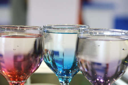 colorful cocktail in wine glass, restaurantの写真素材