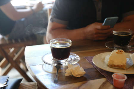 retro color tone, people with black coffee cupの写真素材