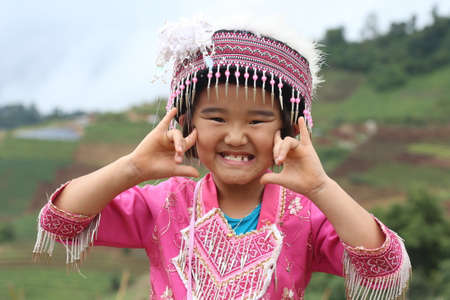 CHIANG MAI, THAILAND - OCTOBER 25 : Portrait of unidentified Akha hill tribe children with traditional at Wat Phratat Doi Suthep on OCTOBER 25, 2014 in Chiang Mai, Thailand.のeditorial素材