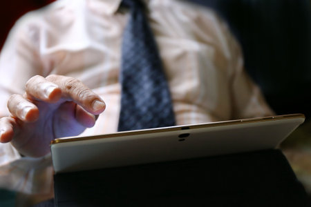 businessman hand use tablet for workの写真素材