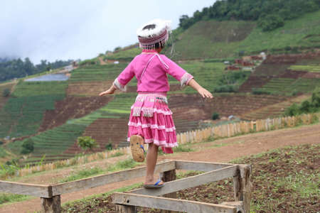 CHIANG MAI, THAILAND - OCTOBER 25 : Portrait of unidentified Akha hill tribe children with traditional at Wat Phratat Doi Suthep on OCTOBER 25, 2014 in Chiang Mai, Thailand.のeditorial素材