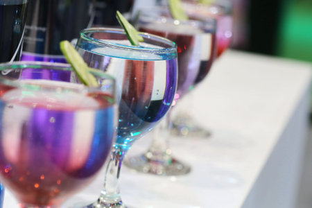 colorful cocktail in wine glass, restaurantの写真素材