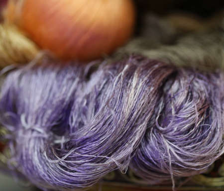 colorful raw silk thread in basketの写真素材