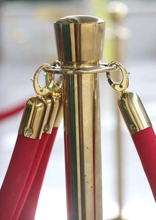 Gold stanchion posts at cinemaの写真素材