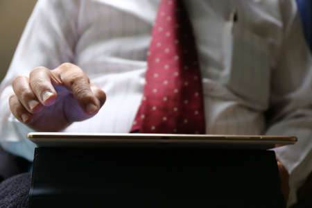 businessman hand use tablet for workの写真素材