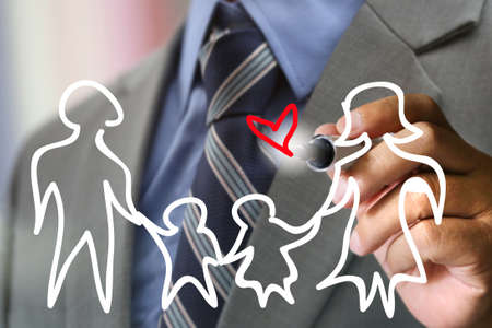 business man's hand writing familyの写真素材