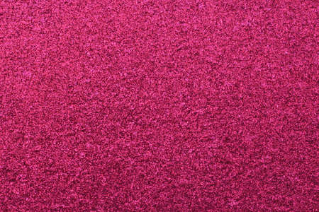 pink shiny paper texture backgroundの写真素材