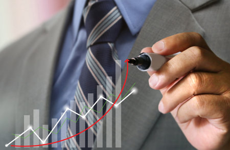business man's hand writing graph chartの写真素材