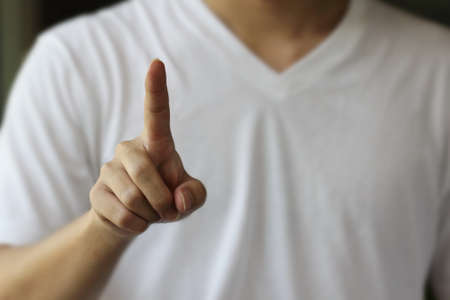 finger point on the air backgroundの写真素材