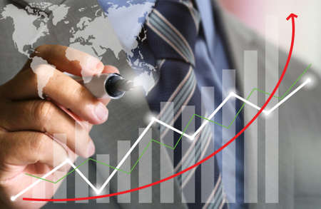 business man's hand writing graph chartの写真素材