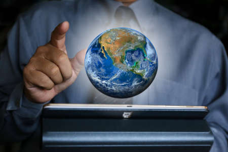 businessman with the earthの写真素材