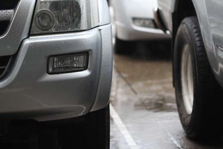 car on wet road with rainの写真素材