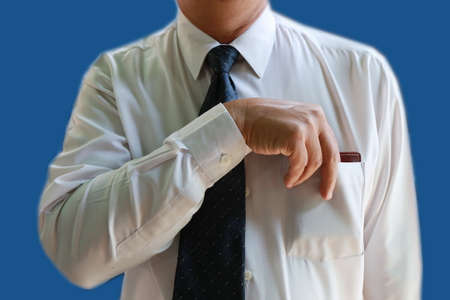 businessman hand pick up wallet from shirt pocketの写真素材